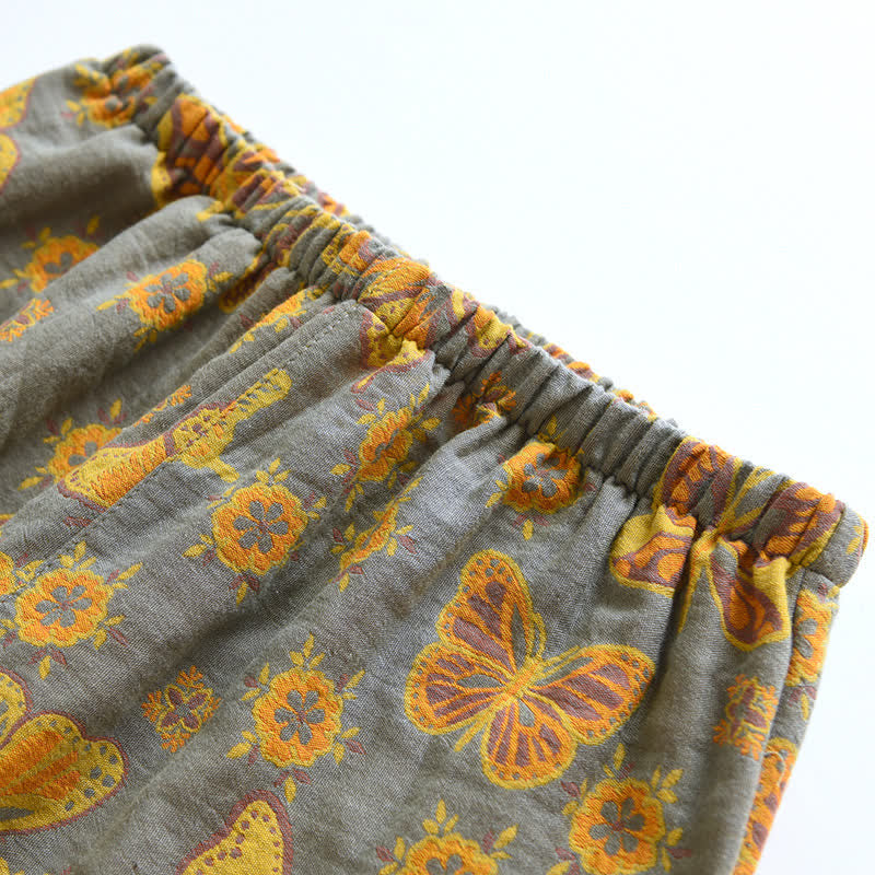 Completo da casa con pantaloni corti in cotone a farfalla