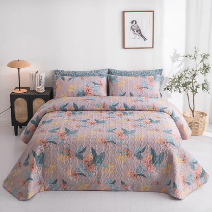 Elegante biancheria da letto trapuntata in puro cotone con motivo floreale