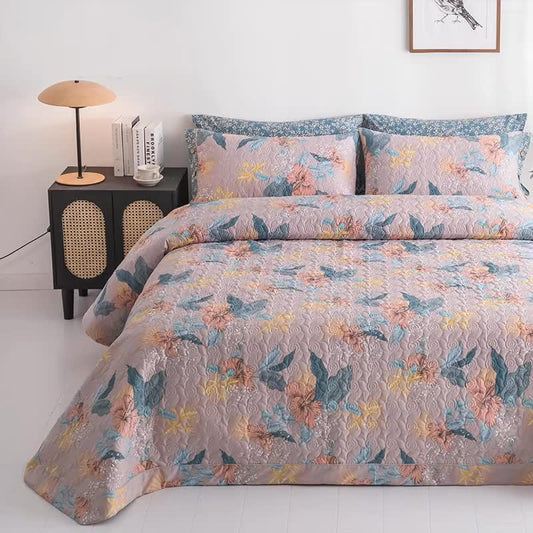 Elegante biancheria da letto trapuntata in puro cotone con motivo floreale