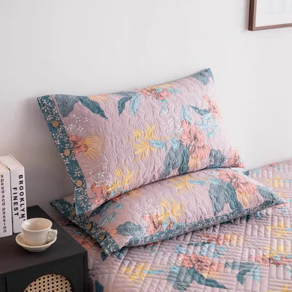 Elegante biancheria da letto trapuntata in puro cotone con motivo floreale