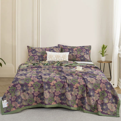 Trapunta reversibile in garza di cotone con motivo floreale Blossom