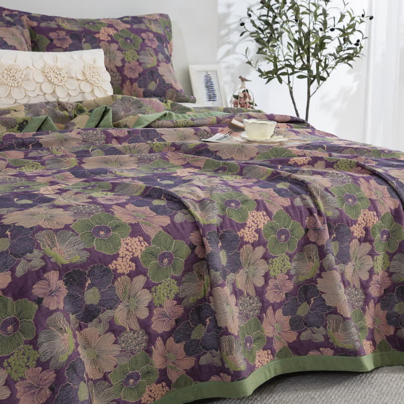 Trapunta reversibile in garza di cotone con motivo floreale Blossom