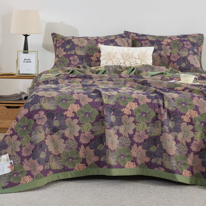 Trapunta reversibile in garza di cotone con motivo floreale Blossom