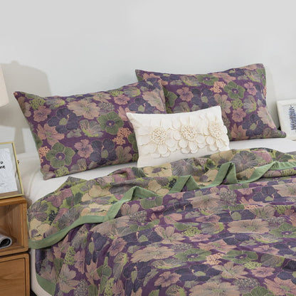 Trapunta reversibile in garza di cotone con motivo floreale Blossom
