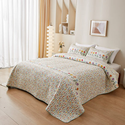 Biancheria da letto trapuntata in puro cotone con motivi floreali colorati