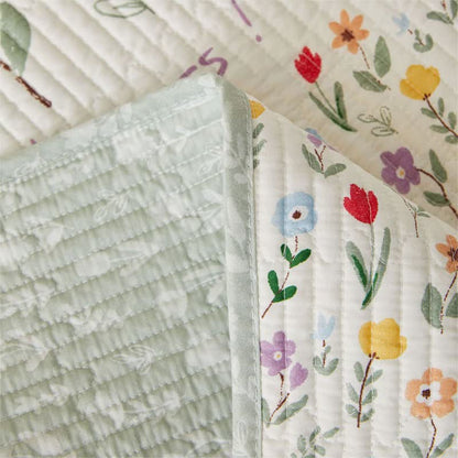Biancheria da letto trapuntata in puro cotone con motivi floreali colorati
