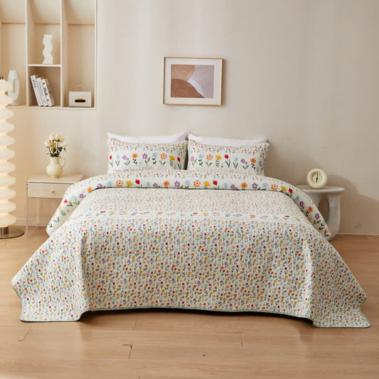 Biancheria da letto trapuntata in puro cotone con motivi floreali colorati