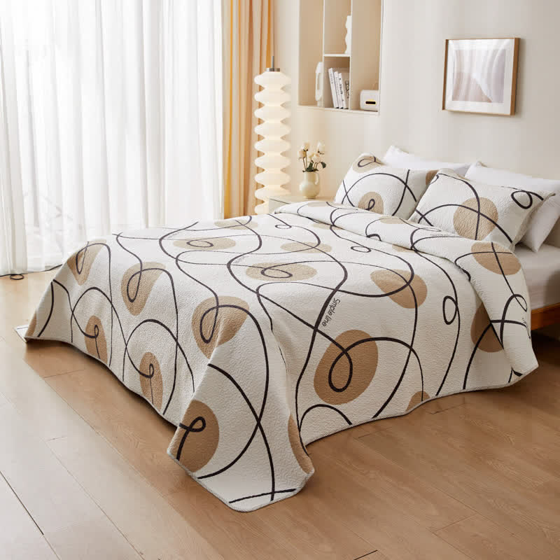 Biancheria da letto trapuntata in puro cotone con motivo geometrico astratto
