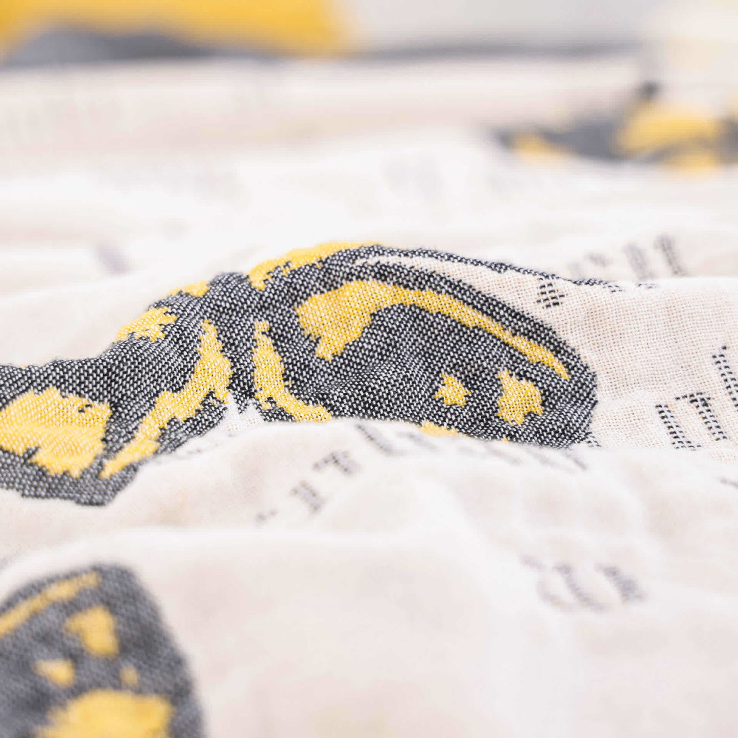 Trapunta con nappe a farfalla in garza di cotone jacquard