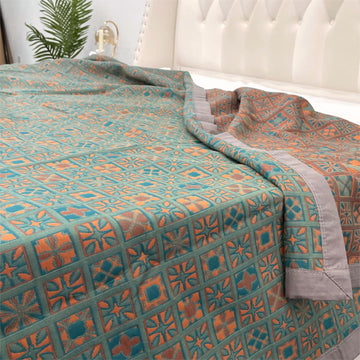 Trapunta reversibile in puro cotone a quadri e fiori