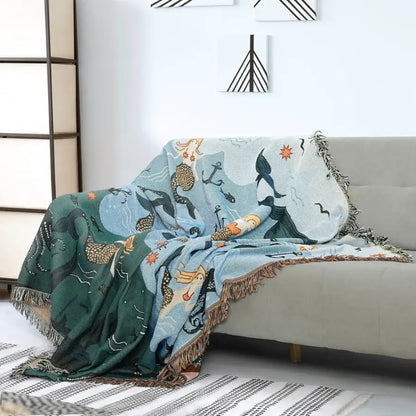 Copridivano con sirena Ownkoti e coperta con nappe di palma