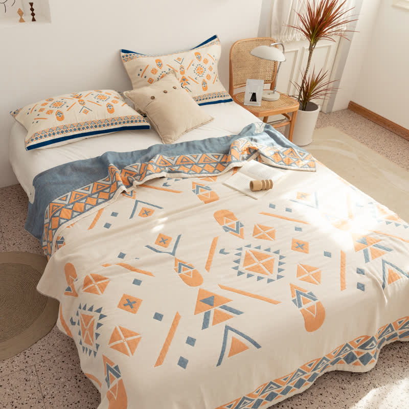 Trapunta reversibile geometrica bohémien in garza di cotone