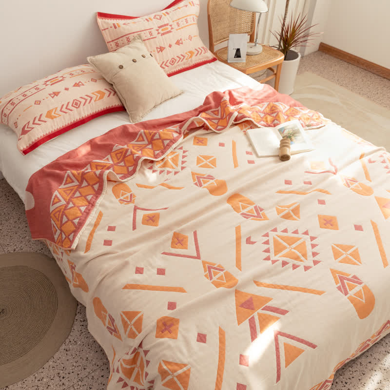 Trapunta reversibile geometrica bohémien in garza di cotone