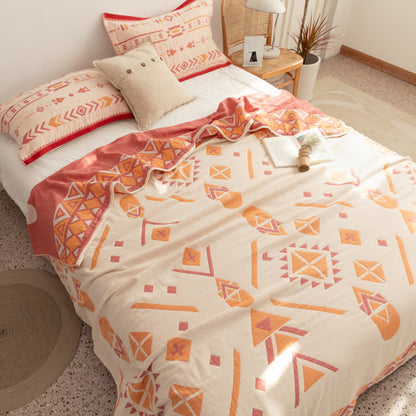 Trapunta reversibile geometrica bohémien in garza di cotone
