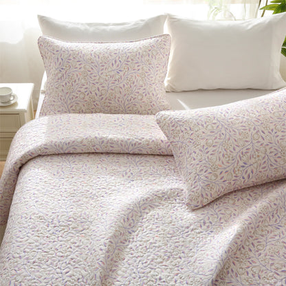Biancheria da letto estiva trapuntata con motivi floreali in cotone