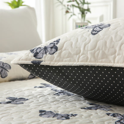 Elegante biancheria da letto trapuntata in puro cotone con motivo a farfalla