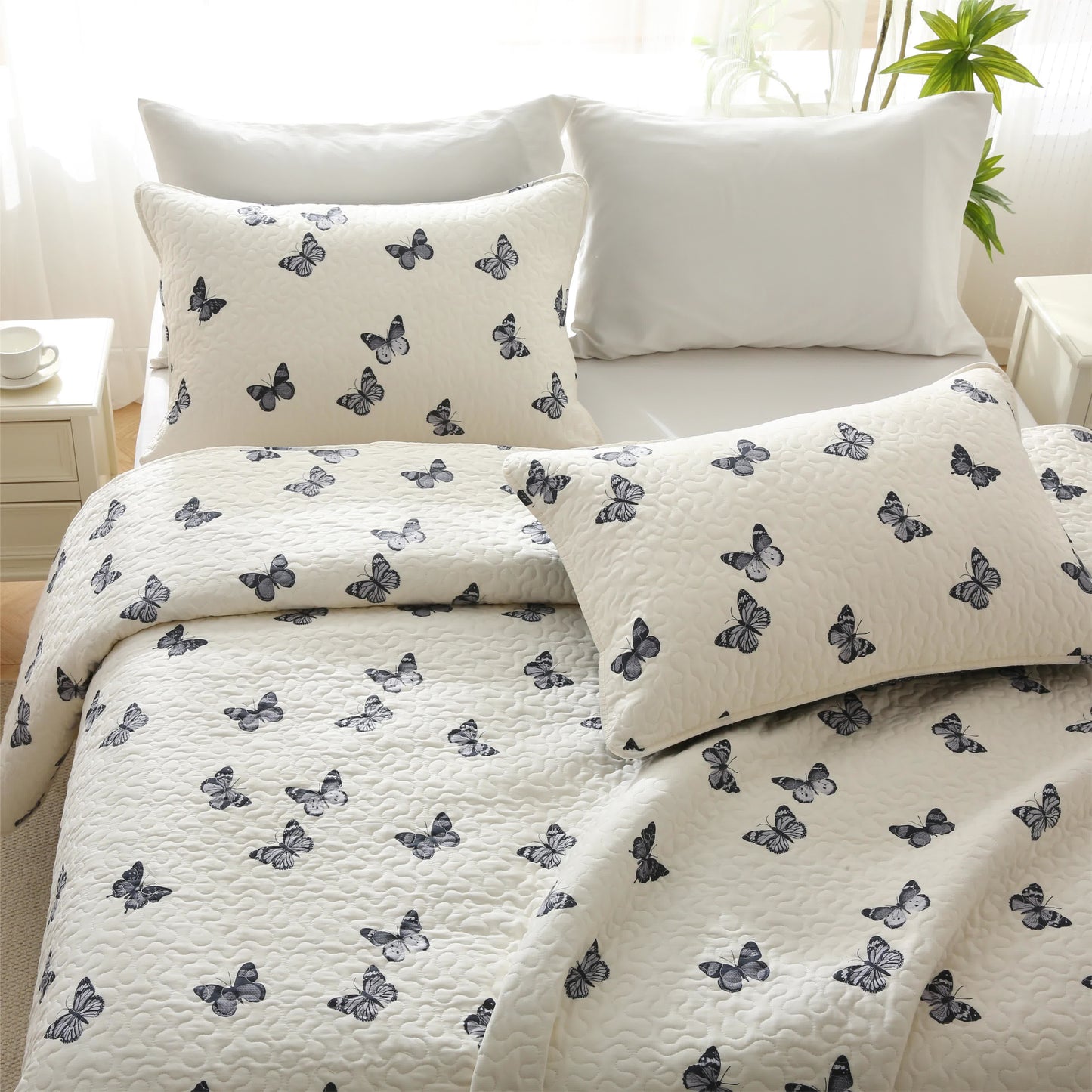 Elegante biancheria da letto trapuntata in puro cotone con motivo a farfalla