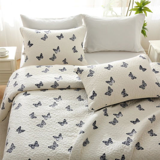 Elegante biancheria da letto trapuntata in puro cotone con motivo a farfalla