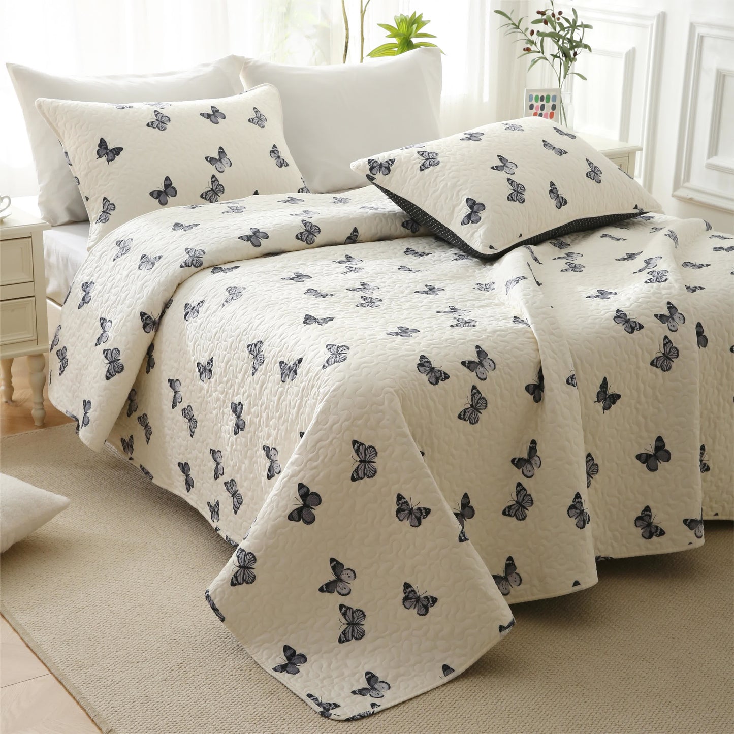 Elegante biancheria da letto trapuntata in puro cotone con motivo a farfalla
