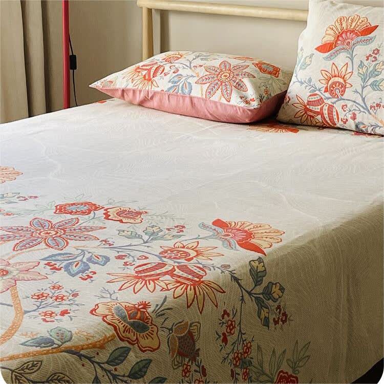 Trapunta in garza di cotone traspirante con fiori rustici