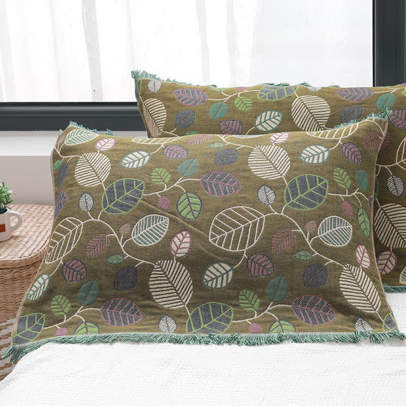 Cuscino in garza di cotone con nappe e foglie (2 pezzi)