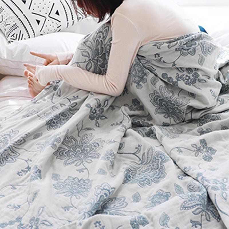 Trapunta reversibile leggera in cotone con stampa floreale