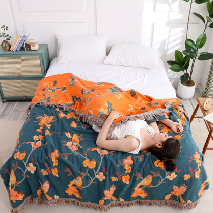 Trapunta reversibile con nappe in cotone floreale Magpie
