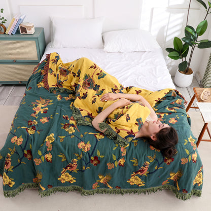 Trapunta reversibile con nappe in cotone floreale Magpie