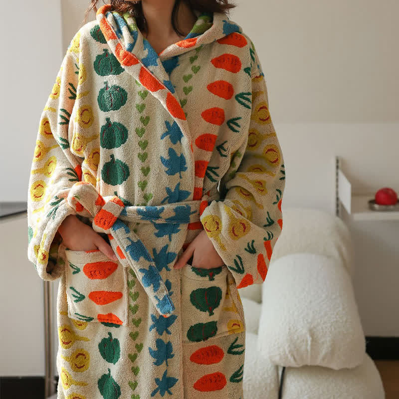 Accappatoio con cappuccio in cotone con motivo vegetale colorato