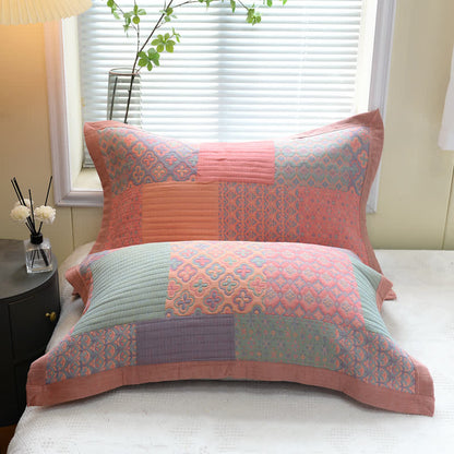 Trapunta reversibile in cotone con motivo quadrato colorato