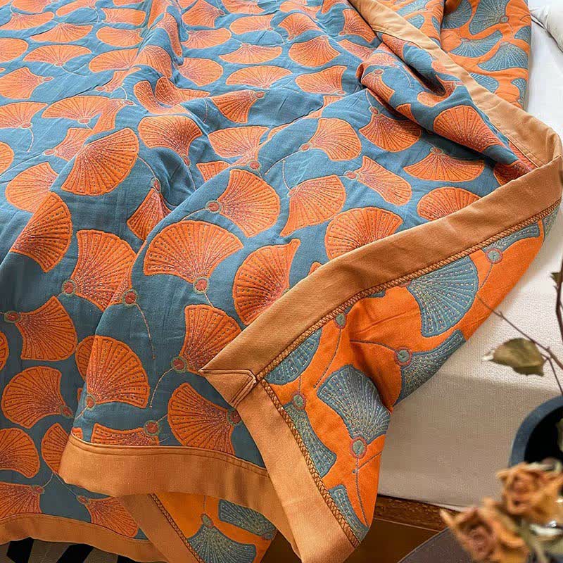 Trapunta reversibile in cotone brillante con foglie di ginkgo