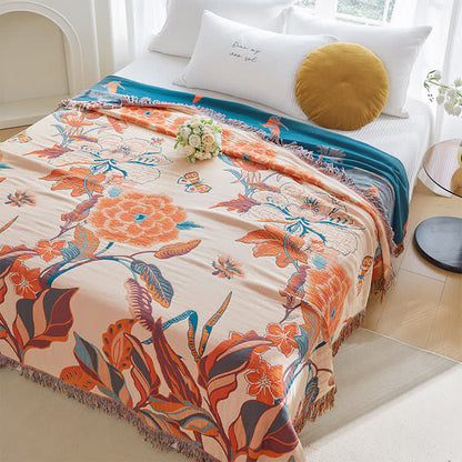 Trapunta in garza di cotone con nappe, fiori e foglie