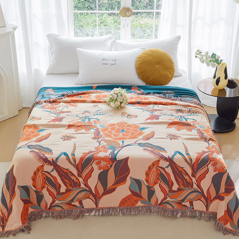 Trapunta in garza di cotone con nappe, fiori e foglie