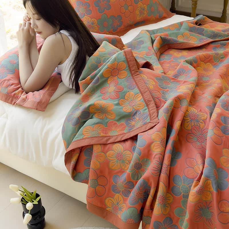 Trapunta reversibile in cotone jacquard con splendido motivo floreale