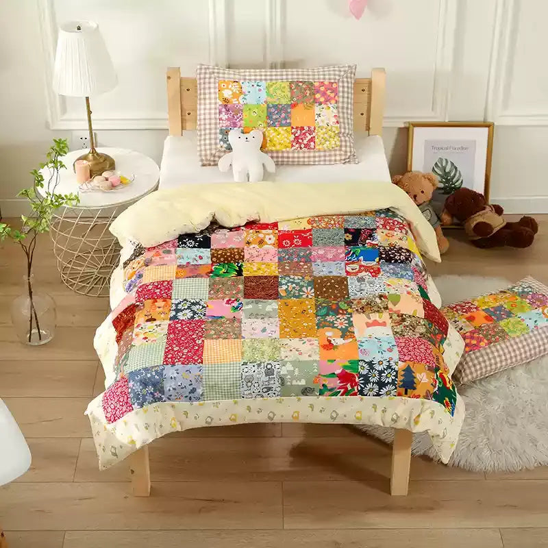 Trapunta per neonati in puro cotone con motivo patchwork floreale