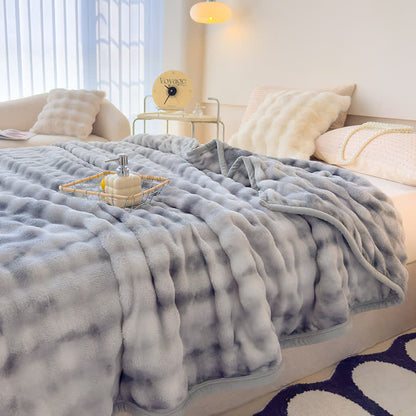 Coperta in soffice flanella con sfumature di colore