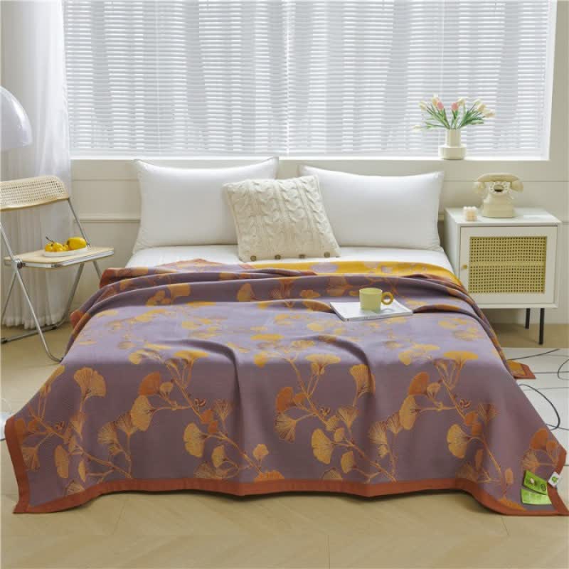 Trapunta reversibile in cotone jacquard con foglie di ginkgo