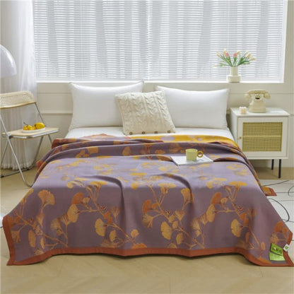 Trapunta reversibile in cotone jacquard con foglie di ginkgo