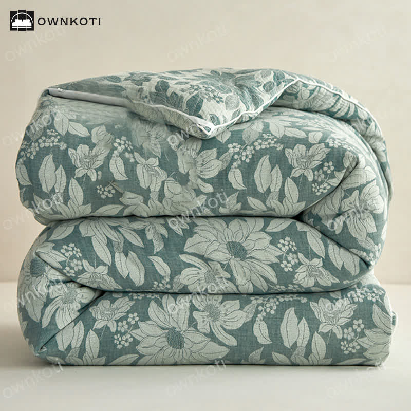 Trapunta floreale in cotone jacquard tinto in filo
