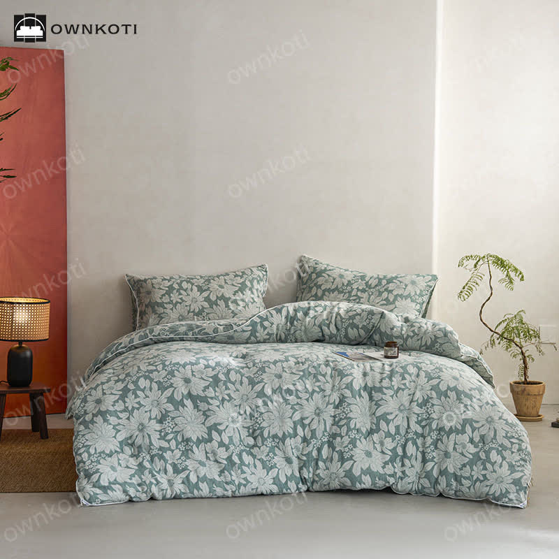 Trapunta floreale in cotone jacquard tinto in filo