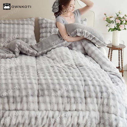 Coperta calda in pile doppio con anima trapuntata