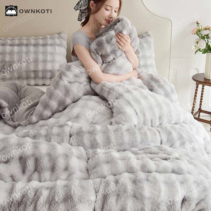 Coperta calda in pile doppio con anima trapuntata