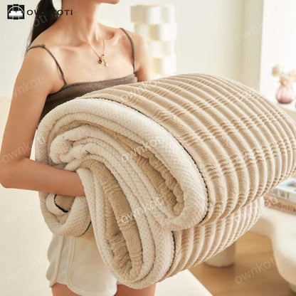 Coperta in pile con trama a onde jacquard