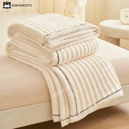 Coperta in pile con trama a onde jacquard