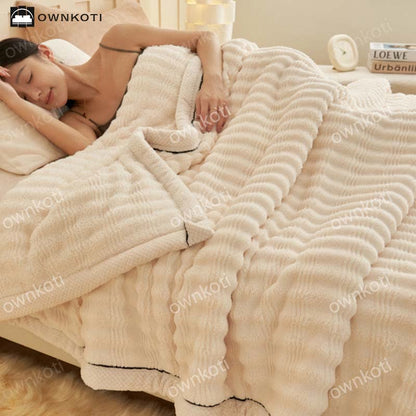 Coperta in pile con trama a onde jacquard