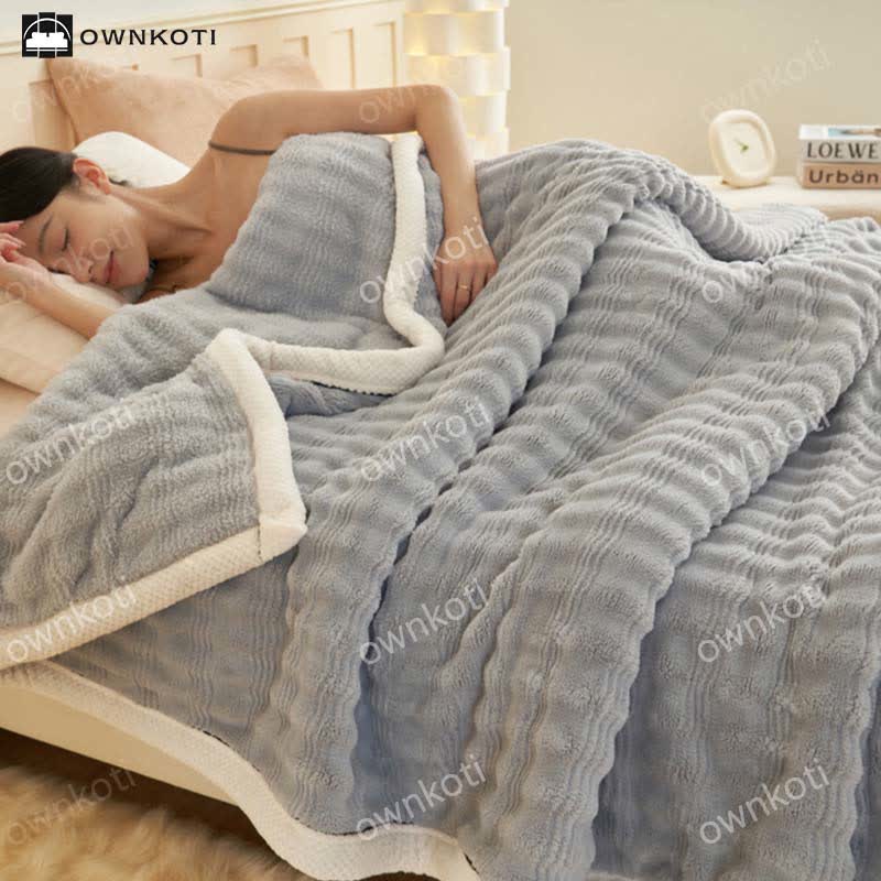 Coperta in pile con trama a onde jacquard