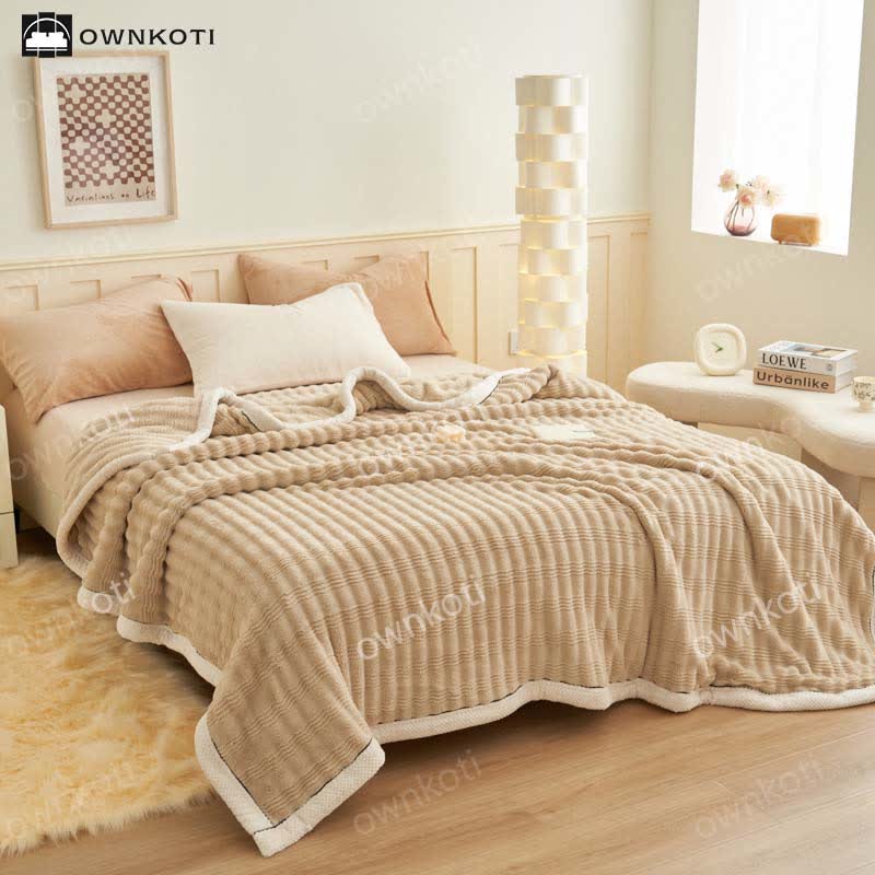 Coperta in pile con trama a onde jacquard