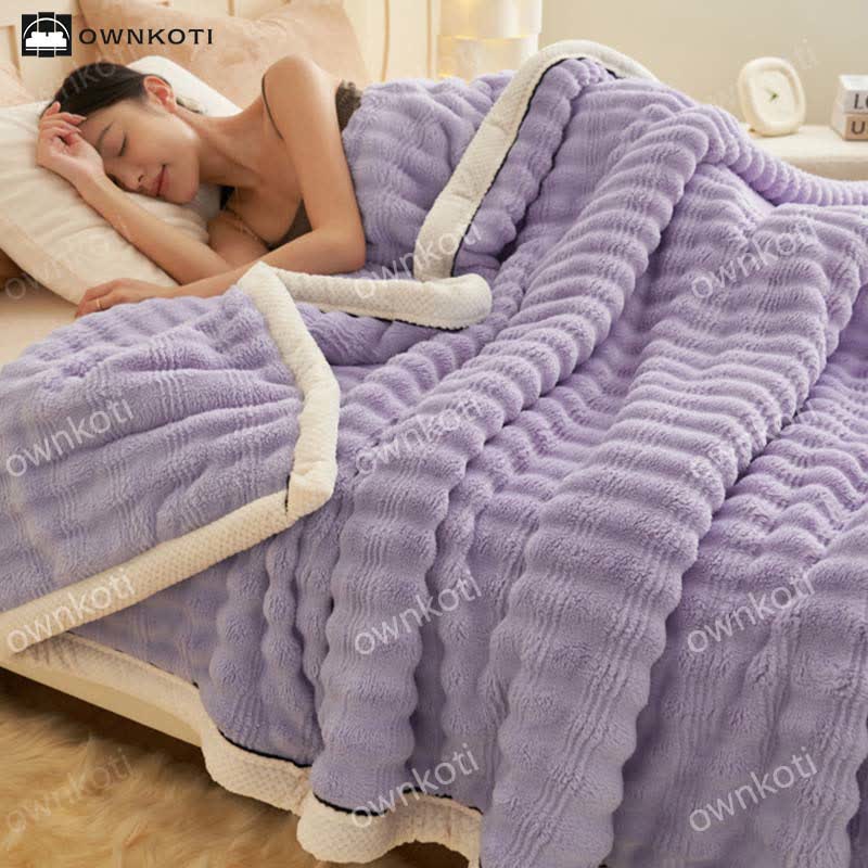 Coperta in pile con trama a onde jacquard