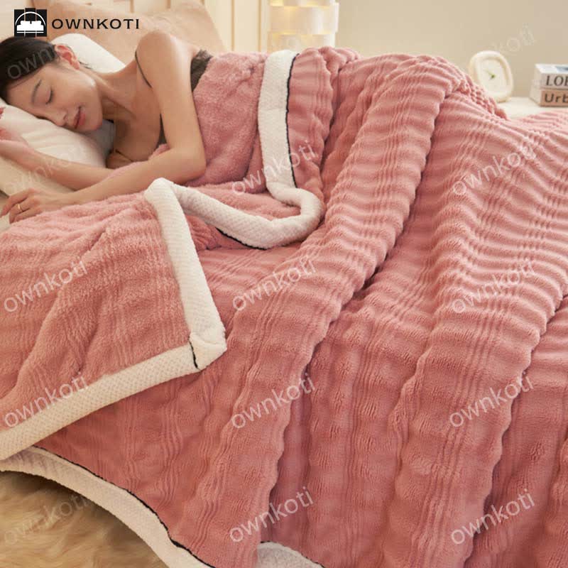 Coperta in pile con trama a onde jacquard
