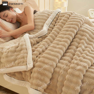 Coperta in pile con trama a onde jacquard